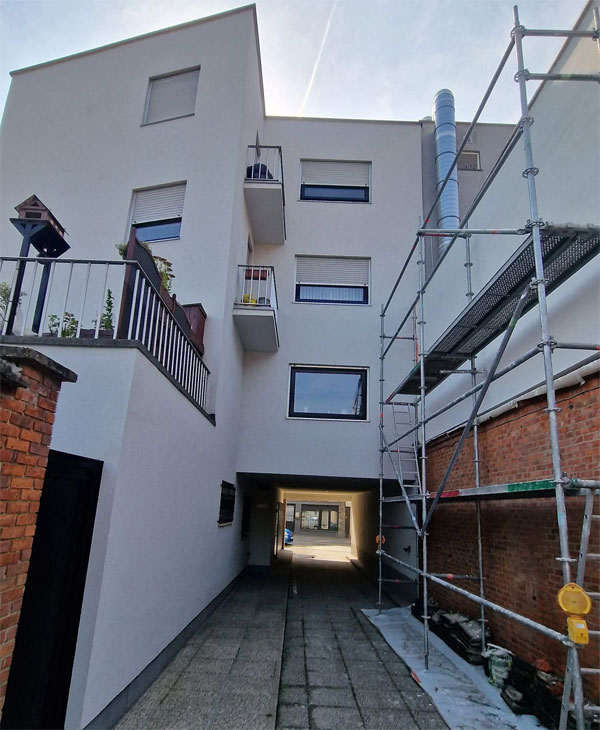 Geïsoleerde gevel na gevelisolatie en afwerking door DS Construct